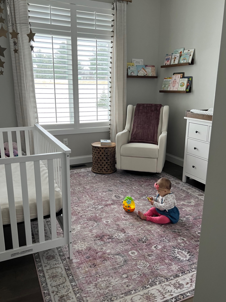 baby girl nursery with mauve accents