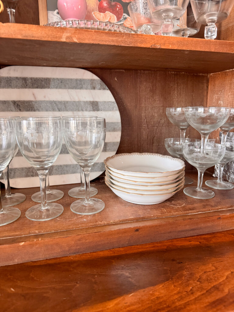 glasses, decorative bowls, cutting board
