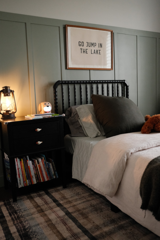 cozy vintage boys bedroom view with night stand