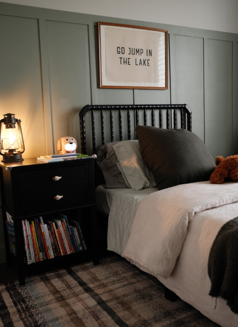 cozy vintage boys bedroom view with night stand