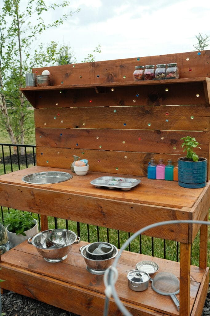DIY mud kitchen with accessories